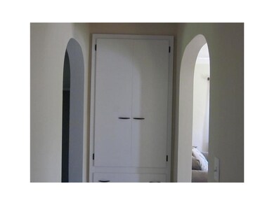 Closet. Large built-in storage off kitchen