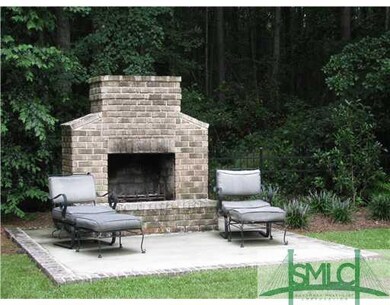 Other. Close up view of custom backyard fireplace 