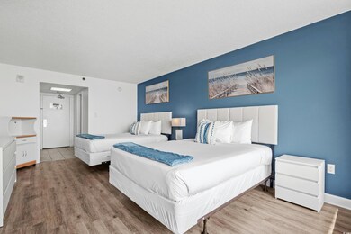 Bedroom with light hardwood / wood-style floors an