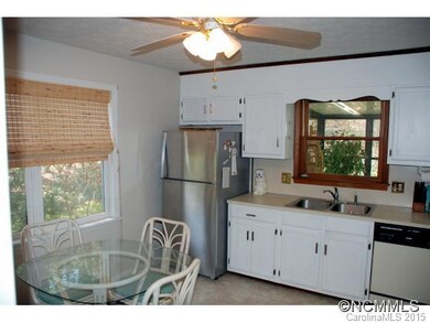 Kitchen overlooks sun porch