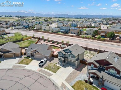 Aerial view of residential area featuring mountain