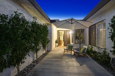 ENTRY COURTYARD NIGHT MLS