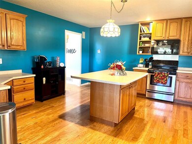 Open kitchen with built in office area or coffee b