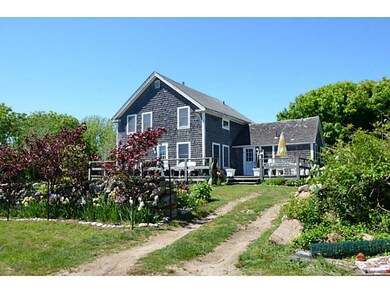 Exterior Front. House & shed need work