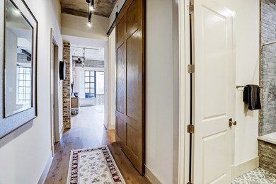 Entryway with secondary bedroom & bathroom to the