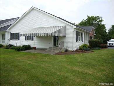 Backyard. Back Patio off living room.  Awning is i