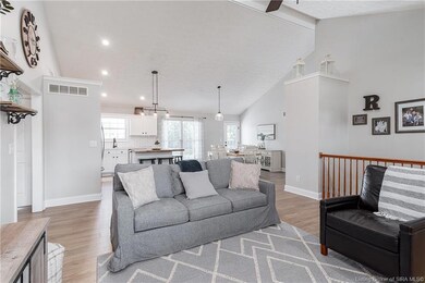 Living room flows easily into the stunning kitchen