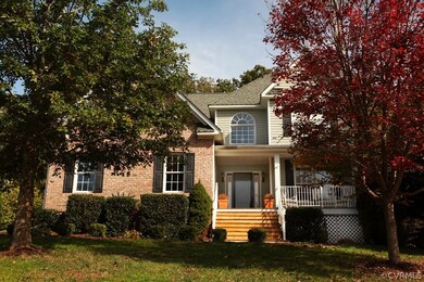 Partial brick front, side entry garage, and large