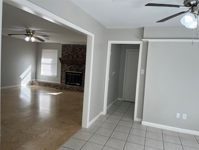 Living room leading to the breakfast area and Laundry room