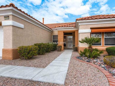 Property Photo. Front Sidewalk to Covered Entry