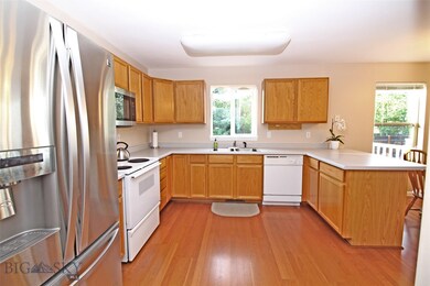 Kitchen with entry to 2 car attached Garage
