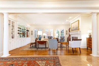 Open the front door to this open foyer and formal living room.