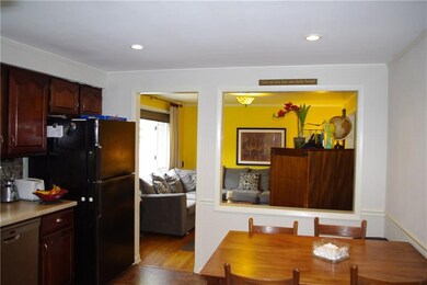 This Kitchen is open to the living room area to pr