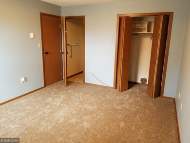 master bedroom half bath and closet area