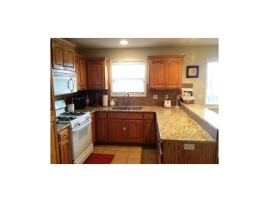 Updated Granite Counter, tile backsplash