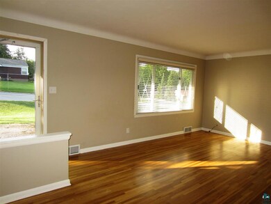 features hardwood floors.