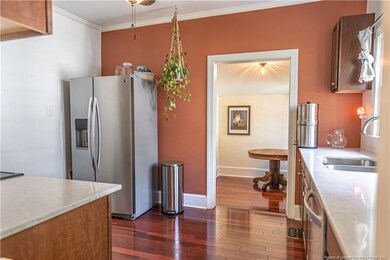 Kitchen Opens to Formal Dining Room