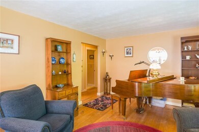 This room is quite large with great hardwoods. The