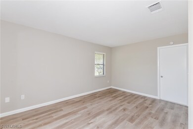 Spare room featuring light hardwood / wood-style flooring