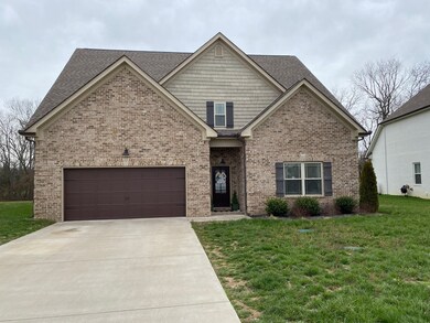 Front view of home with plenty of parking for all of your guests!