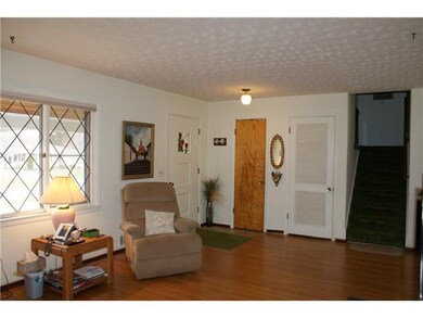 Living Room. Large front window and hardwood floor