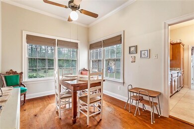 Large windows brighten this keeping room/breakfast