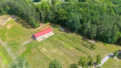Aerial view of property and surrounding area featu
