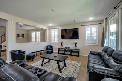 Living area featuring plenty of natural light, lig