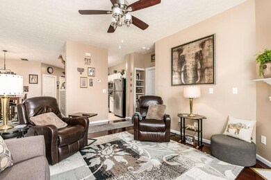 OPENS TO THE KITCHEN & DINING ROOM