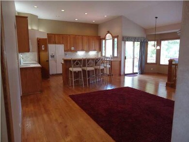 Looking into the hearth / kitchen from the arched 