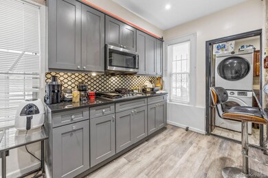 4239 Elbertson St, Elmhurst, NY 11373 - photo 3