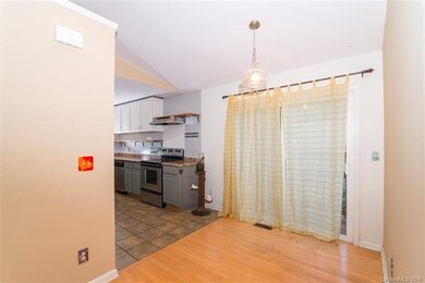 Dining area open to kitchen and the outdoors.