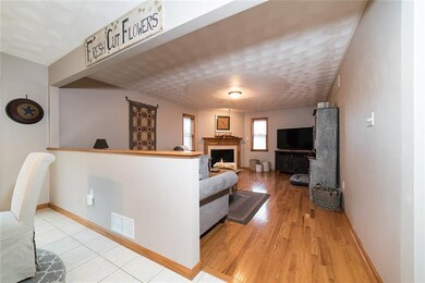FAMILY ROOM ADJACENT TO LARGE EAT-IN KITCHEN.