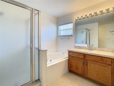 Master Bath featuring garden tub & walk-in shower