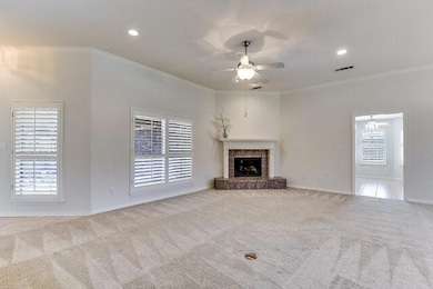 Unfurnished living room featuring crown molding, b