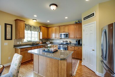 Kitchen prep area with granite counter tops and stainless steel appliances with large walk in pantry. Any cook will feel at home in this warm and inviting space.