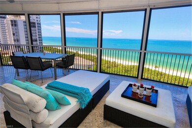 Sunroom / solarium featuring a water view and a vi