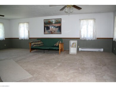 Newly laid carpeting in the huge living room with 