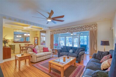 Great room with large sliding doors to the Florida room