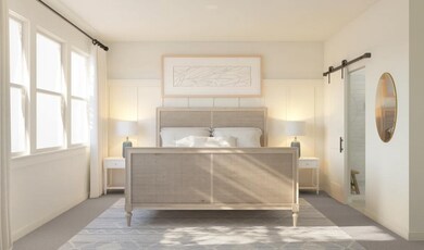 Primary suite with decorative feature wall