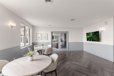 Community room attached to the kitchen.