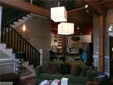 Living Room. Soaring wood ceilings with exposed beams
