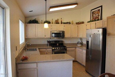 Open Kitchen with SS Appliances