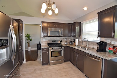 Stunning Painted Cabinets, SS Appliances and Brand
