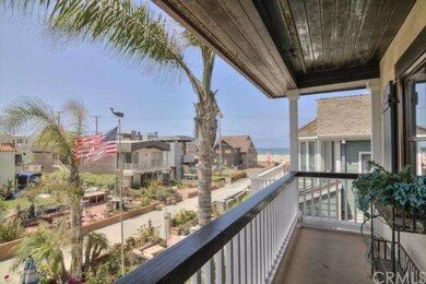 Master bedroom balcomy with ocean and sand views.