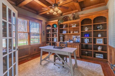 Cozy Office with Custom Built In's and Coffered Ceiling