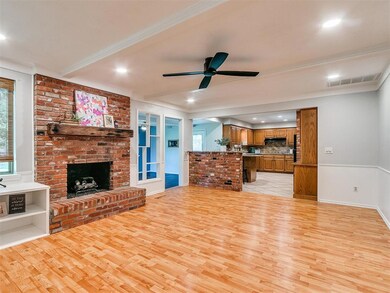 Living room featuring light tile patterned floors,