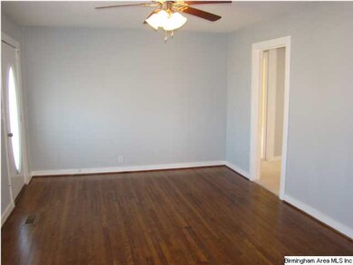 Living room has hardwood floors.