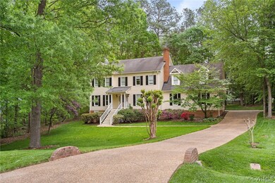 Paved driveway, rear load garage