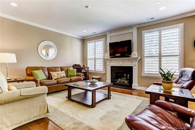 Great Room with Gas Fireplace, Wood Flooring, and 